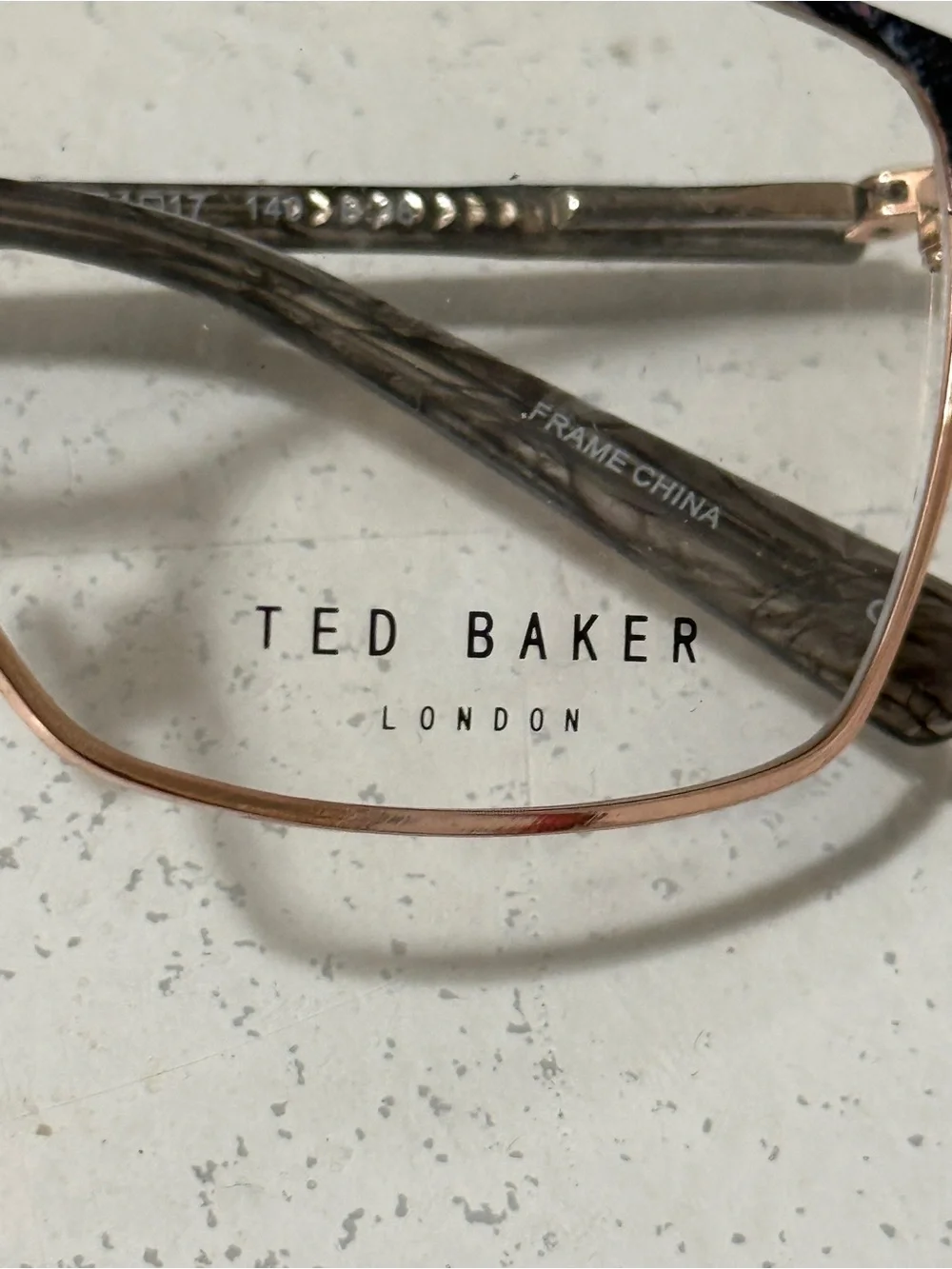 Ted Baker London purple clear lance glasses with green case